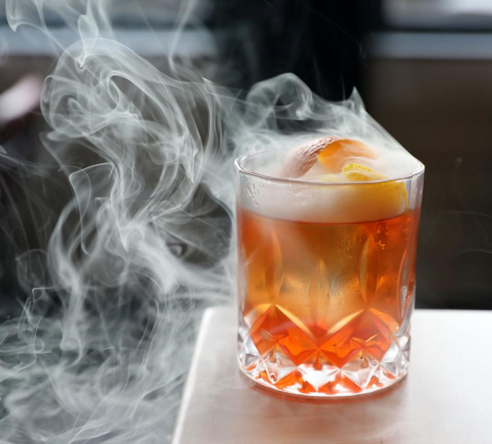 The Good Ol' Smokey, an Old Fashioned cocktail prepared by bartender Tommy Quintano at Archie Grand on Mamaroneck Avenue in White Plains, May 13, 2022. 