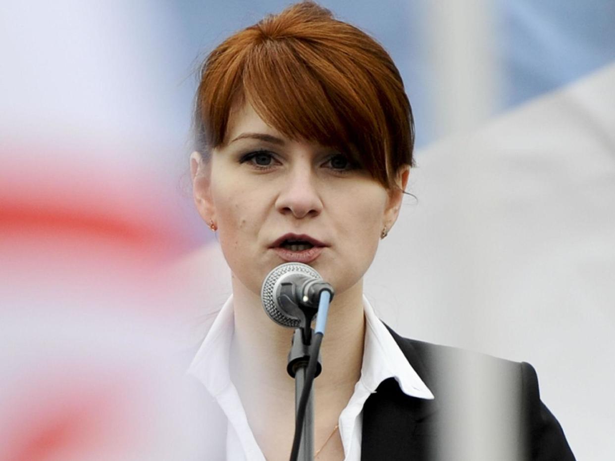 Maria Butina speaks to a crowd during a rally in support of legalizing the possession of handguns in Moscow in 2013