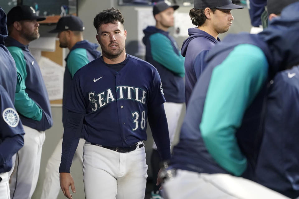 Seattle Mariners starting pitcher Robbie Ray walks in the dugout after he was pulled during the sixth inning of a baseball game against the Philadelphia Phillies, Tuesday, May 10, 2022, in Seattle. (AP Photo/Ted S. Warren)