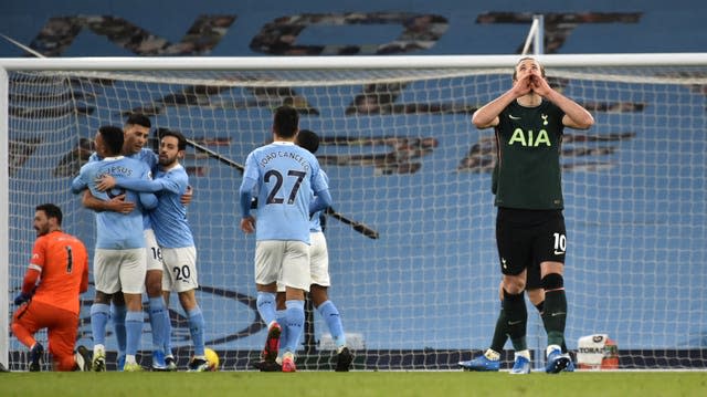 Harry Kane, right, reacts after Rodri scores for Manchester City