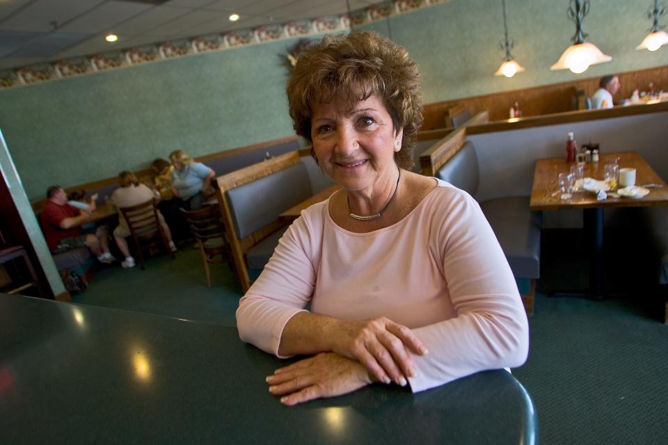 In this Sept. 28, 2007 photo, Maria Perdikis, owner of Newport Restaurant, poses in the dining room. The 90-seat eatery in the Graystone Plaza shopping center off Del. 4, opened in 1982 and has mostly booths. It is a haven for comfort food lovers.