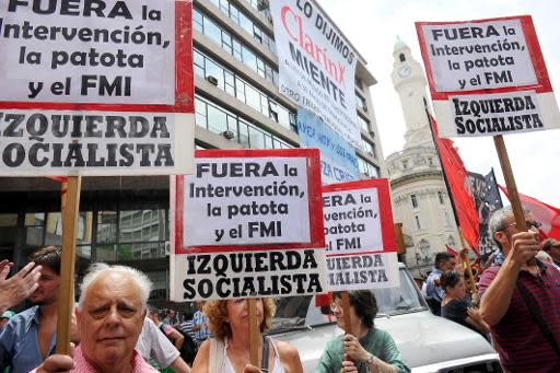 Un grupo de manifestantes protesta frente a la sede del Instituto Nacional de Estadística y Censos de Argentina, el 13 de febrero de 2014 en Buenos Aires (AFP/Archivos | Daniel García)