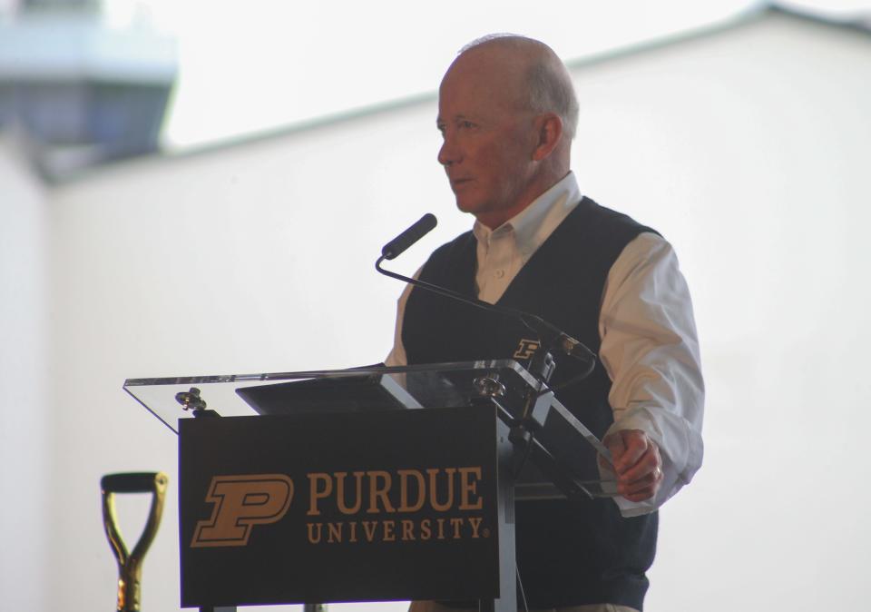 Mitch Daniels, former Purdue University President speaks during the Purdue University airport's groundbreaking event for the new Amelia Earhart Terminal and inaugural flight of Southern Airways's new Purdue-themed aircraft, on Tuesday, May 14, 2024, in West Lafayette, Ind.