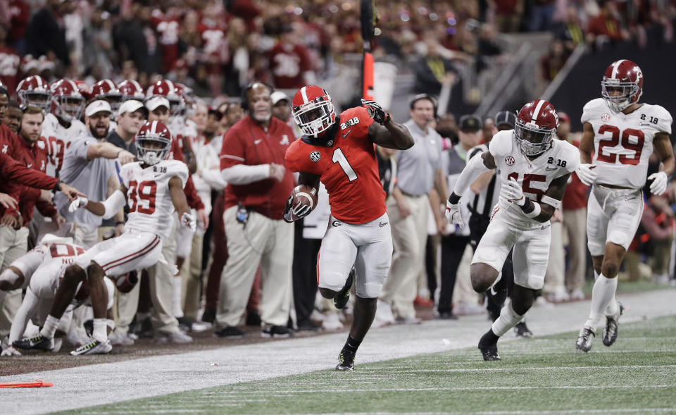 Sony Michel's performance in two playoff games erased any thoughts of him becoming a sleeper pick in the NFL draft. (AP) 