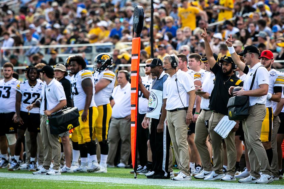 Iowa head coach Kirk Ferentz watches from the sideline during the Vrbo Citrus Bowl against Kentucky,