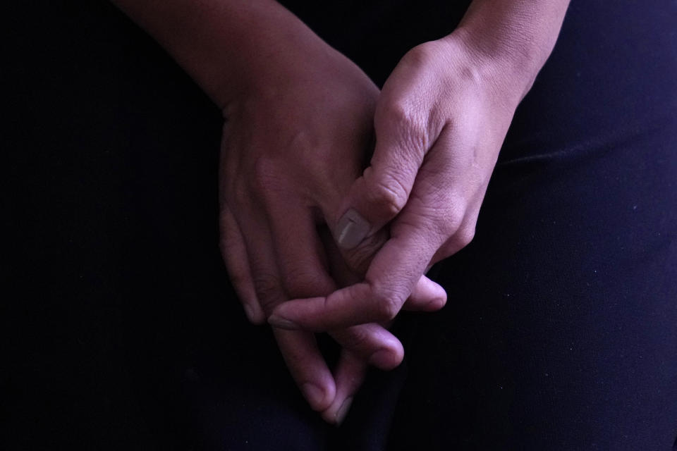 A Myanmar refugee, 26, who fled during the violence in the town of Mindat in Chin state, northwestern Myanmar, talks to the Associated Press at an undisclosed location, in India, Monday, Dec. 13, 2021. (AP Photo/Manish Swarup)