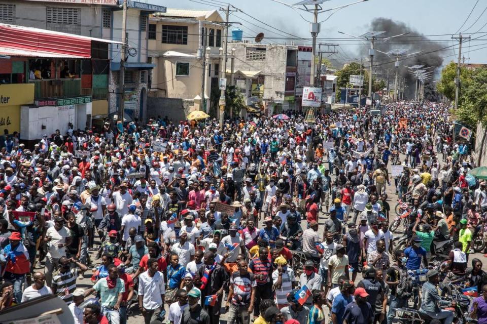 Haitians demonstrate during a protest to denounce the draft constitutional referendum carried by the President Jovenel Moise on March 28, 2021 in Port-au-Prince.