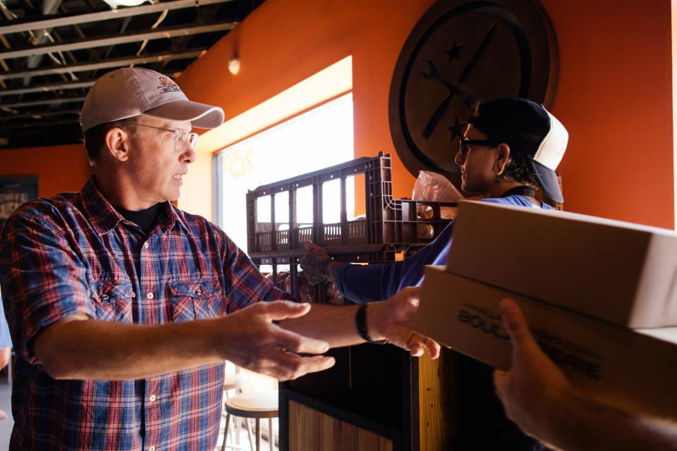 Brian Luscher opened up Luscher's Red Hots as a drop spot for food for Dallas Police Officers. (Photo: Kathy Tran/Dallas Observer)