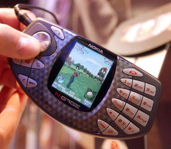 N-GAGE -- Nokia released this cell phone-cum-gaming platform in 2003, and blessed it with a handset design that made unfortunate users look like they were attempting to eat a taco with their ear. Unsurprisingly, it was not a success. The N-Gage brand lives on as a games service for other smartphones, but saddled with such an impractical hardware layout, the N-Gage itself has long been consigned to history's scrap pile.