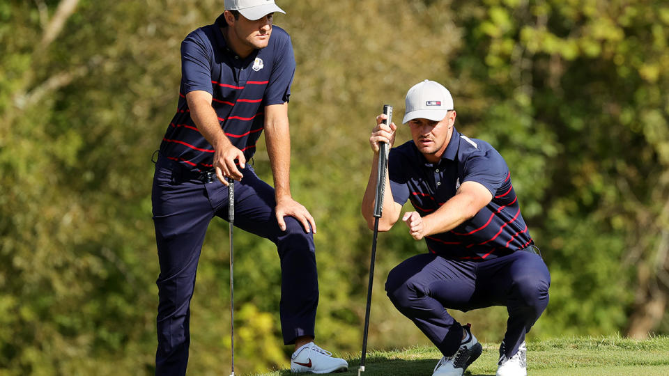 Scottie Scheffler and Bryson DeChambeau in action at the Ryder Cup. (Photo by Stacy Revere/Getty Images)