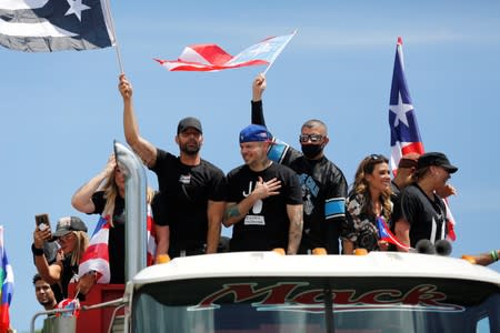 Puerto Rican celebrities including Residente, Bad Bunny and Ricky Martin join demonstrators during a protest calling for the resignation of Governor Ricardo Rossello in San Juan