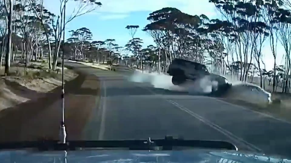 With nowhere else to go, the oncoming 4WD smashes into the sedan sending it spinning out of control before nearly flipping on its roof. Source: Facebook / Dash Cam Owners Australia