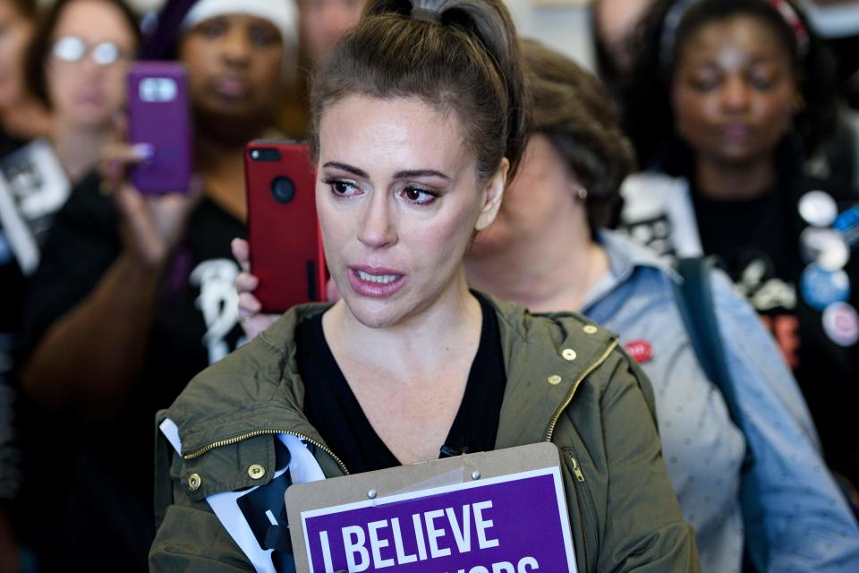 Alyssa Milano gathers with other activists in the office of Sen, Susan M. Collins during protests against Judge Brett Kavanaugh on Sept. 26, 2018, in Washington.