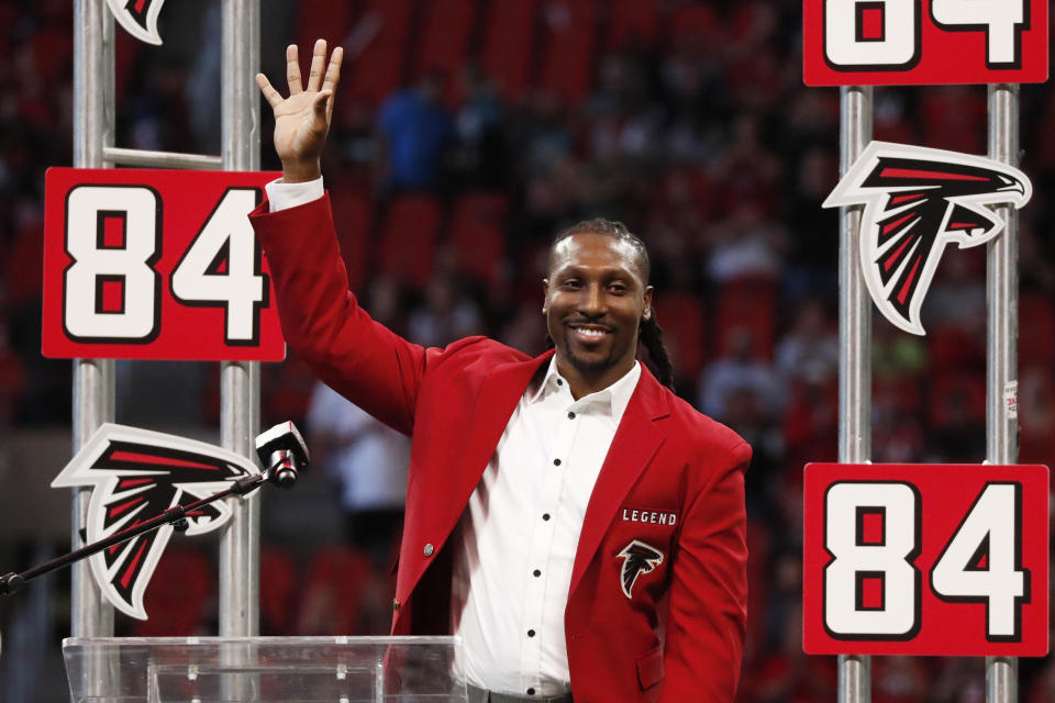 Former Atlanta Falcons player Roddy White speaks during a Falcons Ring of Honor ceremony during half time of an NFL football game between the Atlanta Falcons and the Carolina Panthers, Sunday, Dec. 8, 2019, in Atlanta. (AP Photo/John Bazemore)