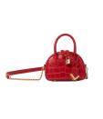 <p>The Kooples Nano Red Crocodile-Print Bag Irina, $450, <a rel="noopener" href="https://fave.co/2RqM5TB" target="_blank" data-ylk="slk:thekooples.com;elm:context_link;itc:0;sec:content-canvas" class="link ">thekooples.com</a> </p>