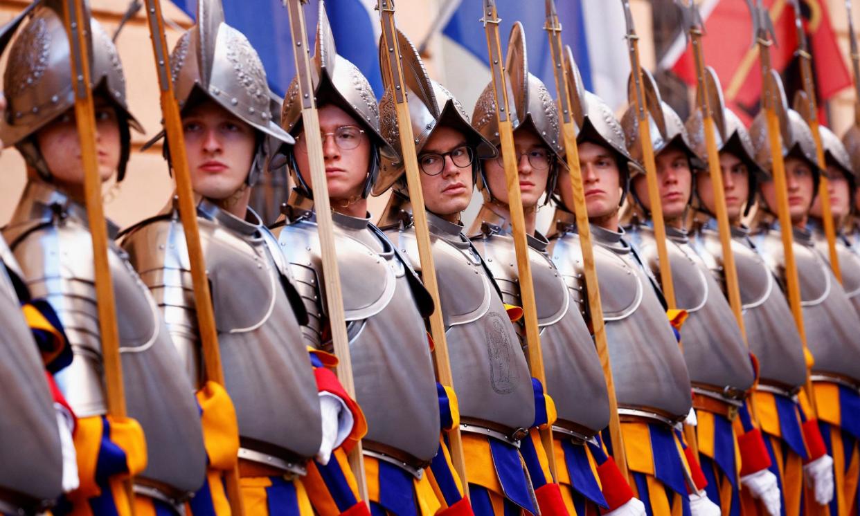 <span>Swiss Guards attend a training session before their swearing-in ceremony at the Vatican.</span><span>Photograph: Guglielmo Mangiapane/Reuters</span>