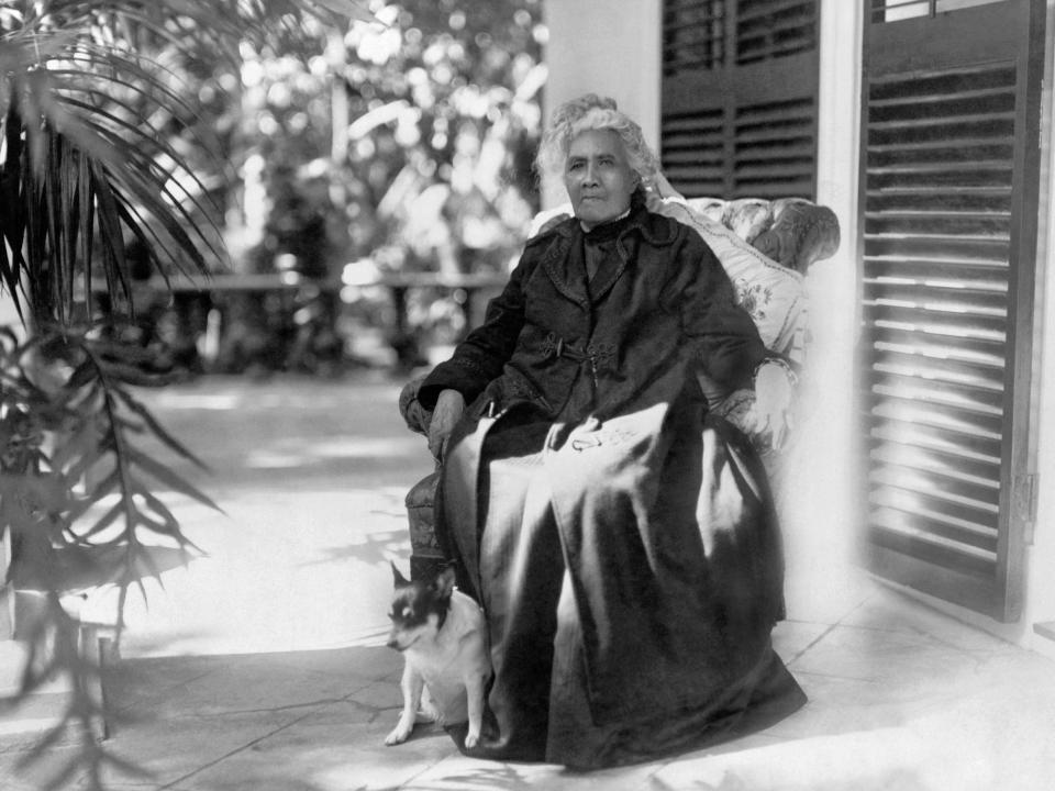A portrait of Lili'uokalani, the Queen of Hawaii in a chair and bathed in sunshine, Honolulu, Hawaii, 1917.