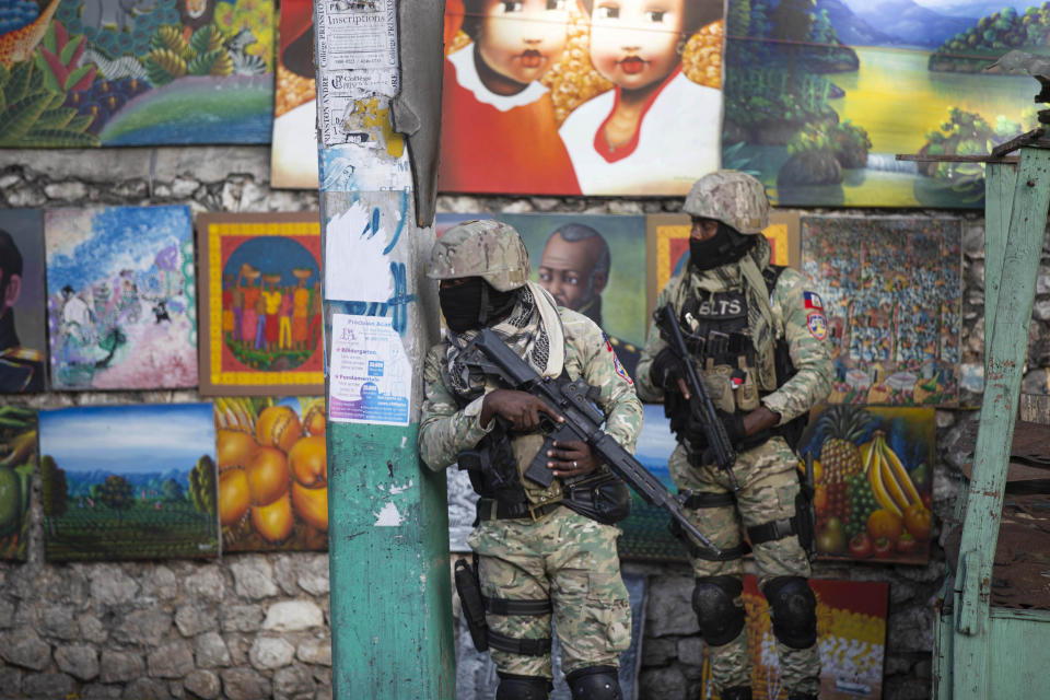 Soldiers patrol in Petion Ville, the neighborhood where the late Haitian President Jovenel Moise lived in Port-au-Prince, Haiti, Wednesday, July 7, 2021. Moïse was assassinated in an attack on his private residence early Wednesday, and first lady Martine Moïse was shot in the overnight attack and hospitalized, according to a statement from the country’s interim prime minister. (AP Photo/Joseph Odelyn)