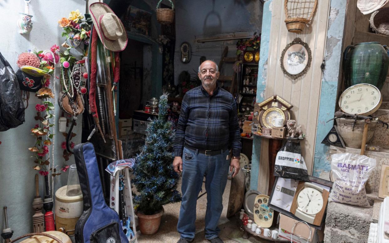 Saadullah Rassam, 63, who claims to be the only Christian currently living in the Old City of Mosul, is photographed inside his house adjacent to The Immaculate Syriac Catholic Church, in Mosul  - Sam Tarling for the Telegraph 