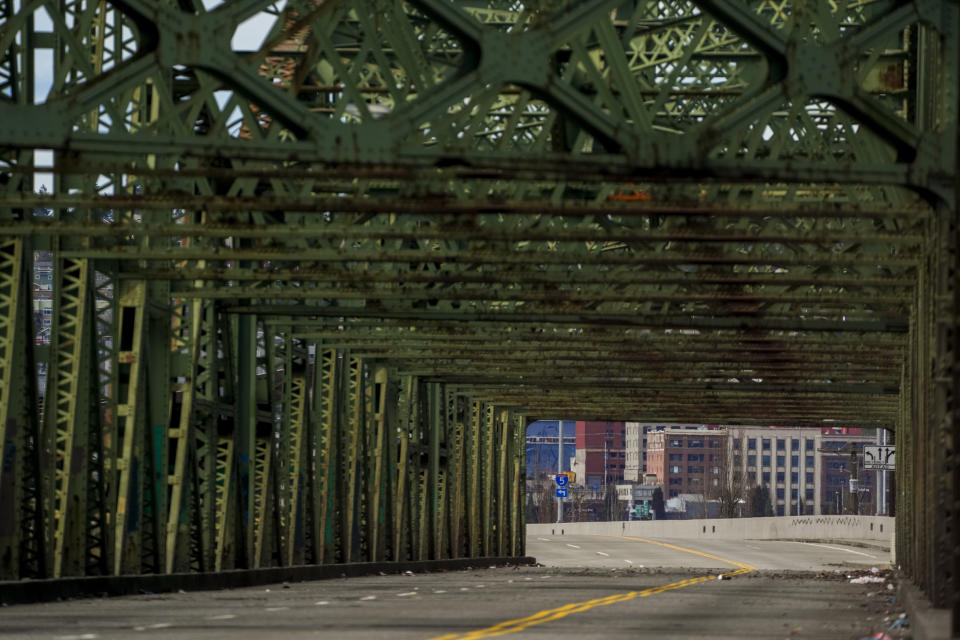 The Fishing Wars Memorial Bridge, which has been closed indefinitely since October 2023 after the Federal Highway Administration raised safety concerns, is shown Tuesday, March 26, 2024, in Tacoma, Wash. Nearby business owners say they have noticed a decrease in customers as traffic has slowed on their street due to the closure. (AP Photo/Lindsey Wasson)