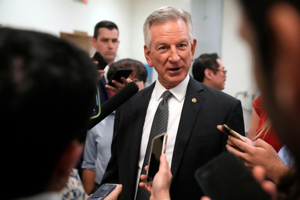 Sen. Tommy Tuberville, R-Ala., talks with reporters as he walks to a vote on Capitol Hill, Wednesday, Sept. 6, 2023 in Washington.