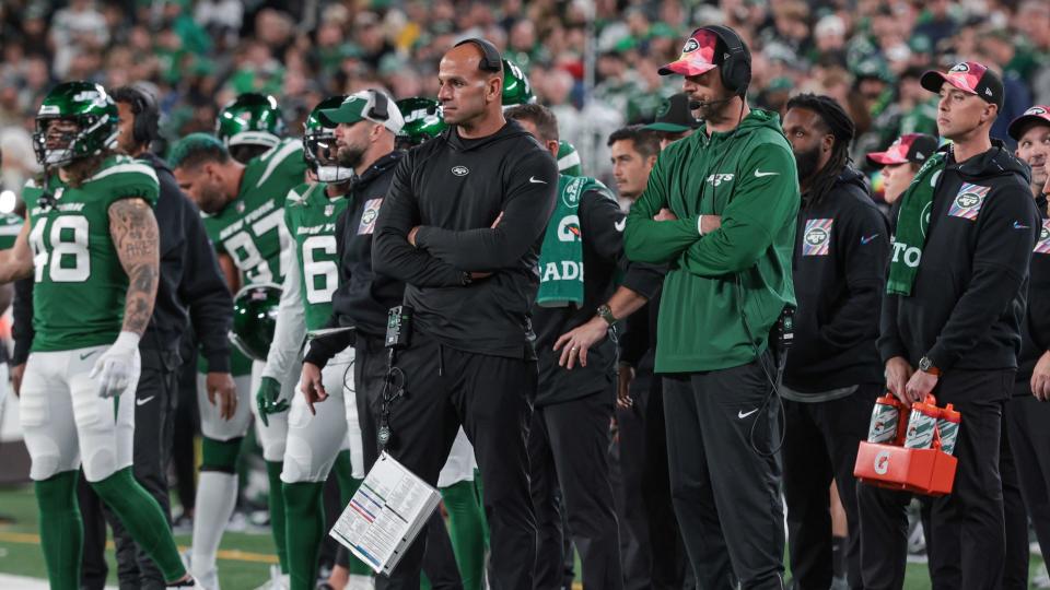 Oct 15, 2023; East Rutherford, New Jersey, USA; New York Jets head coach Robert Saleh (left) an dquarterback Aaron Rodgers (right) looks on during the second half against the Philadelphia Eagles at MetLife Stadium.
