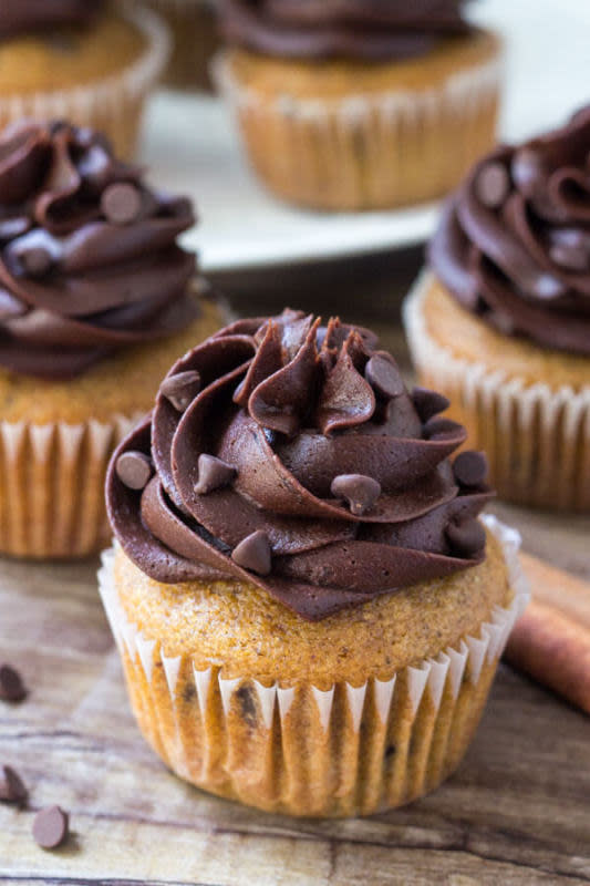 <p>Just So Tasty</p><p>These pumpkin chocolate chip cupcakes are moist, fluffy and topped with fluffy chocolate frosting. They have all your favorite fall flavors thanks to pumpkin, cinnamon, brown sugar and vanilla—then the mini chocolate chips and chocolate buttercream makes for the perfect combo. </p><p><strong>Get the recipe: <em><a href="https://www.justsotasty.com/pumpkin-chocolate-chip-cupcakes/" rel="nofollow noopener" target="_blank" data-ylk="slk:Pumpkin Chocolate Chip Cupcakes;elm:context_link;itc:0;sec:content-canvas" class="link rapid-noclick-resp">Pumpkin Chocolate Chip Cupcakes</a></em></strong></p>