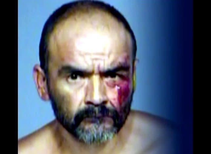 Raymond Garcia, 45, was arrested after cops saw him fighting a street sign.