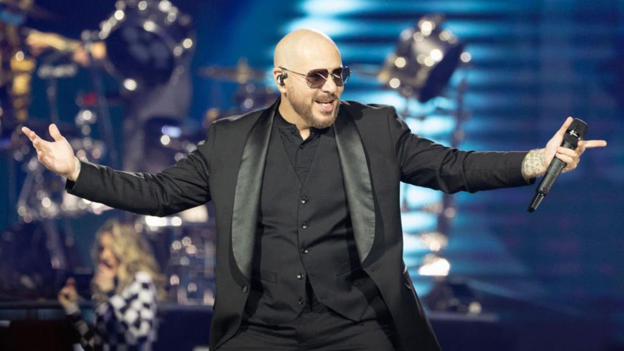 <div>VANCOUVER, BRITISH COLUMBIA - DECEMBER 10: Pitbull performs on stage during The Trilogy Tour at Rogers Arena on December 10, 2023 in Vancouver, British Columbia, Canada. (Photo by Andrew Chin/Getty Images)</div>
