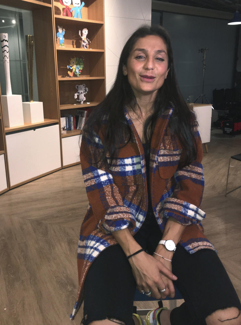 Paris Saint-Germain and Denmark soccer striker Nadia Nadim talks to The Associated Press about her career and her future, in London, Wednesday Dec. 4, 2019. Two decades after fleeing Afghanistan, the famed soccer striker Nadia Nadim is ready to go home, she tells The Associated Press Wednesday, that she will take a chance with her safety because the risks are worth it to inspire girls to follow her onto the soccer field. (AP Photo / Rob Harris)