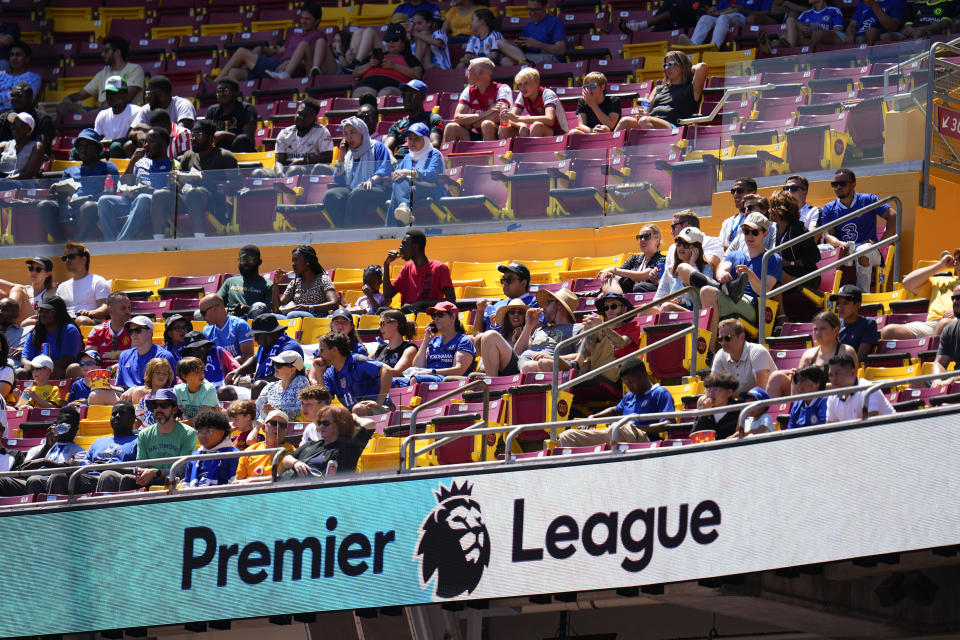 Spectators watch a Premier League Summer Series soccer match between Aston Villa FC and Brentford FC, Sunday, July 30, 2023, in Landover, Md. The teams tied 3-3. (AP Photo/Julio Cortez)