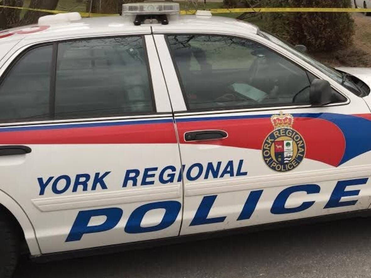 York Regional Police say a Canada-wide arrest warrant has been issued for a man wanted in connection with a fatal shooting in Vaughan. (Greg Ross/CBC - image credit)