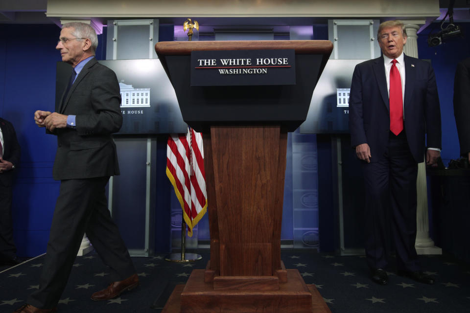 WASHINGTON, DC - APRIL 13:  U.S. President Donald Trump and National Institute of Allergy and Infectious Diseases Director Anthony Fauci during the daily briefing of the White House Coronavirus Task Force at the James Brady Press Briefing Room of the White House April 13, 2020 in Washington, DC. On Monday President Trump tweeted that he will be the one to make the decision to re-open the states in conjunction with the Governors and input from others.  (Photo by Alex Wong/Getty Images)