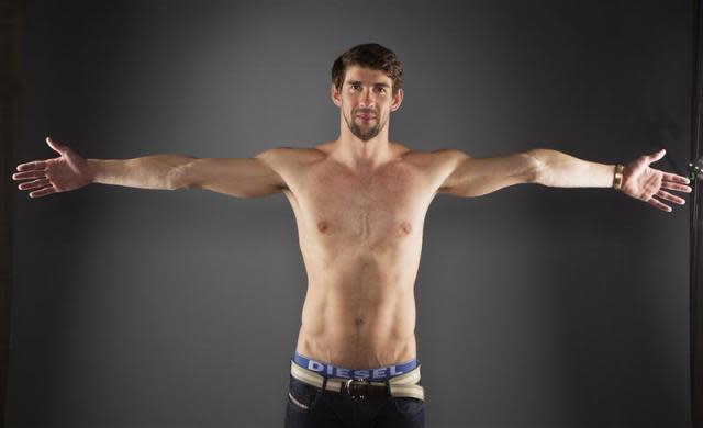 Swimmer Michael Phelps poses for a portrait during the 2012 U.S. Olympic Team Media Summit in Dallas, May 13, 2012.