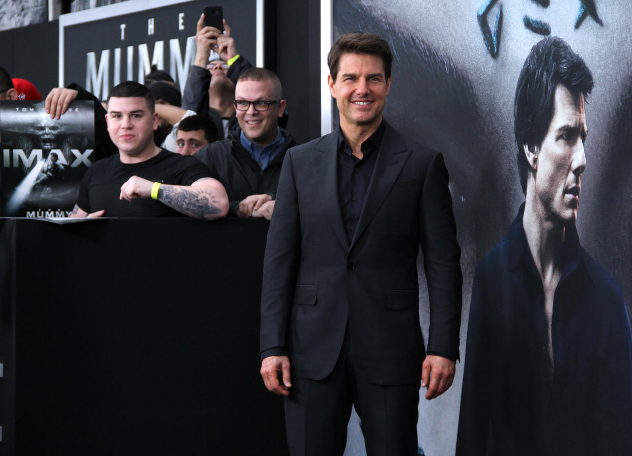 Tom Cruise, pictured at a fan event for “The Mummy” in June, did not use a stunt butt. OK? (Photo: Getty Images)