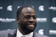 Former Michigan State and current Golden State Warriors player Draymond Green talks to reporters before an NCAA college basketball Tuesday, Dec. 3, 2019, in East Lansing, Mich. (AP Photo/Al Goldis)