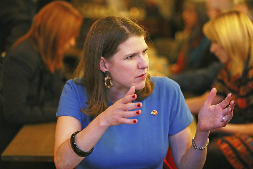 Britain's Liberal Democrat leader Jo Swinson visits a mental health enterprise in North London, Wednesday Nov. 6, 2019. Britain's three major national political parties wooed weary voters on Tuesday, all promising an end to Brexit wrangling if they win next month's national election — but offering starkly different visions of how to achieve that. (Aaron Chown/PA via AP)