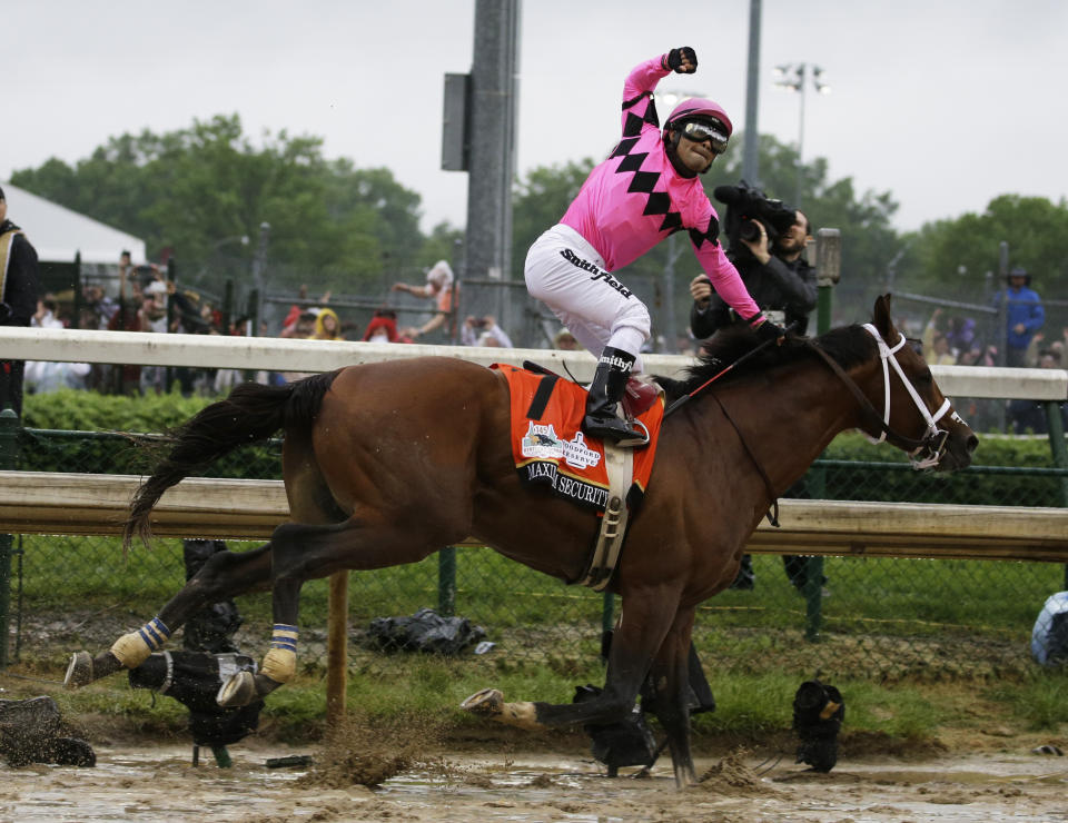 FILE - In this May 4, 2019, file photo, Luis Saez rides Maximum Security across the finish line during the 145th running of the Kentucky Derby horse race at Churchill Downs in Louisville, Ky. Country House was declared the winner after Maximum Security was disqualified following a review by race stewards. Maximum Security will try to move to the top of the 3-year-old thoroughbred division when he takes on scorching heat and a challenging field in the $1 million Haskell Invitational on Saturday, July 20, in Oceanport, N.J..(AP Photo/Kiichiro Sato, file)
