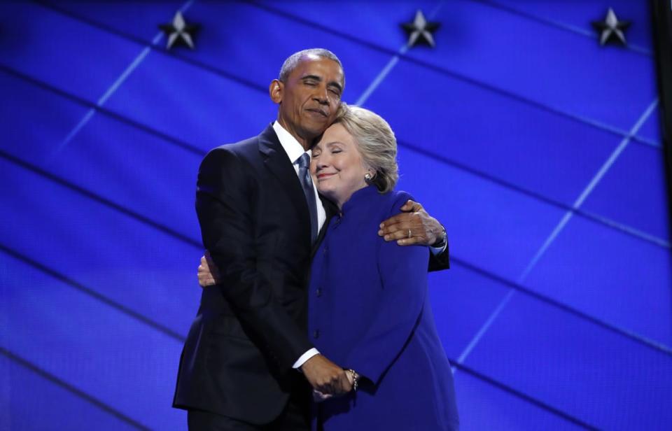 <div class="inline-image__caption"><p>Democratic presidential nominee Hillary Clinton hugs U.S. President Barack Obama as she arrives onstage at the end of his speech on the third night of the 2016 Democratic National Convention in Philadelphia, Pennsylvania, U.S., July 27, 2016. </p></div> <div class="inline-image__credit">Jim Young/Reuters</div>