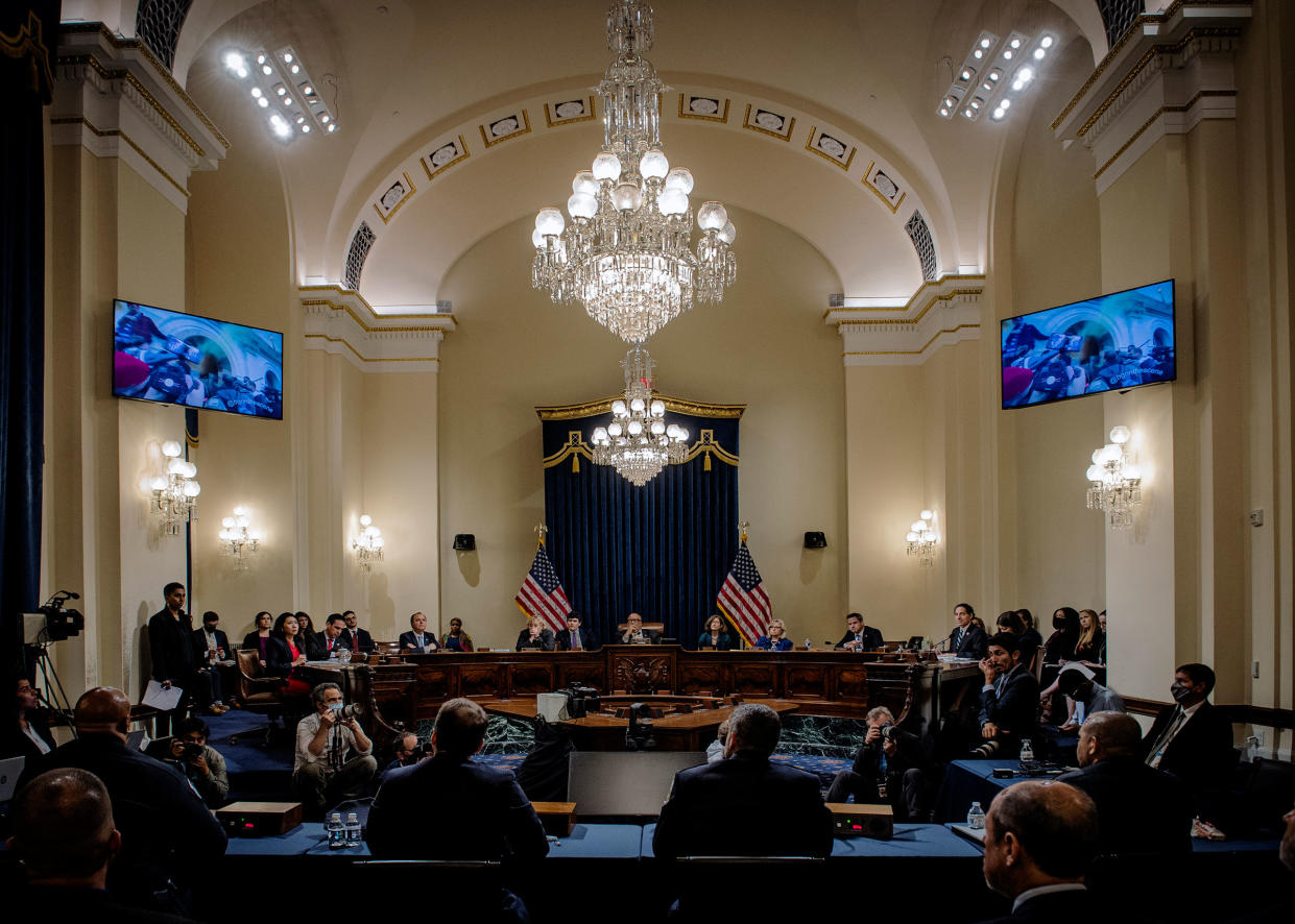 All eyes are on the video monitors to witness clips of the confrontations as the Congressional Jan 6th commission hearing begins, in Washington, on July 27, 2021.