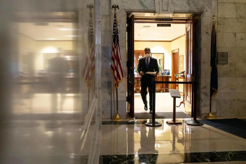 Gov. Andy Beshear walks out of his office to speak about operation United Front which targeted human trafficking that resulted in the rescue of 21 victims and the arrest of 41 individuals during a press conference at the Capitol in Frankfort, Ky., Wednesday, September 1, 2021.