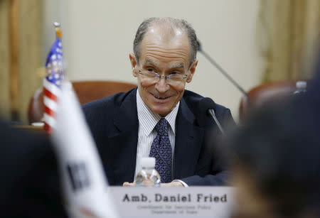 FILE PHOTO - U.S. State Department's Coordinator for Sanctions Policy Ambassador Daniel Fried sits for the high-level sanctions meeting with South Korea's Special Representative for Korean Peninsula Peace and Security Affairs Kim Hong-kyun (not pictured) at the Foreign Ministry in Seoul, South Korea on March 21, 2016. REUTERS/Lee Jin-man/Pool/File Photo