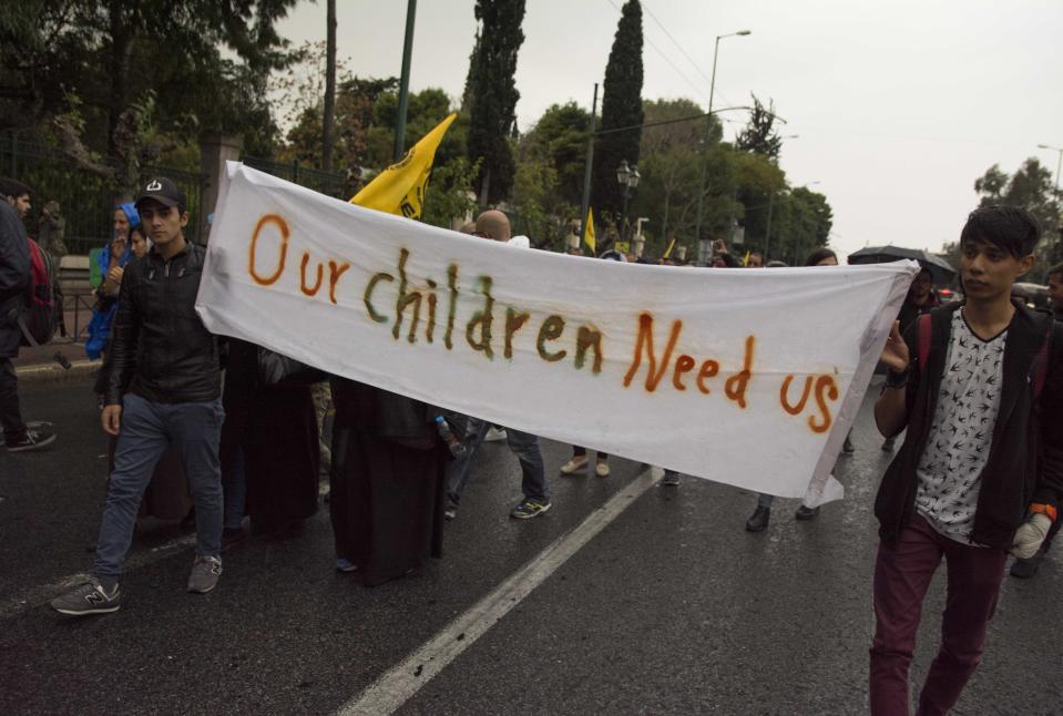 Refugees march demanding to be reunited with their families already in Germany (Rex)