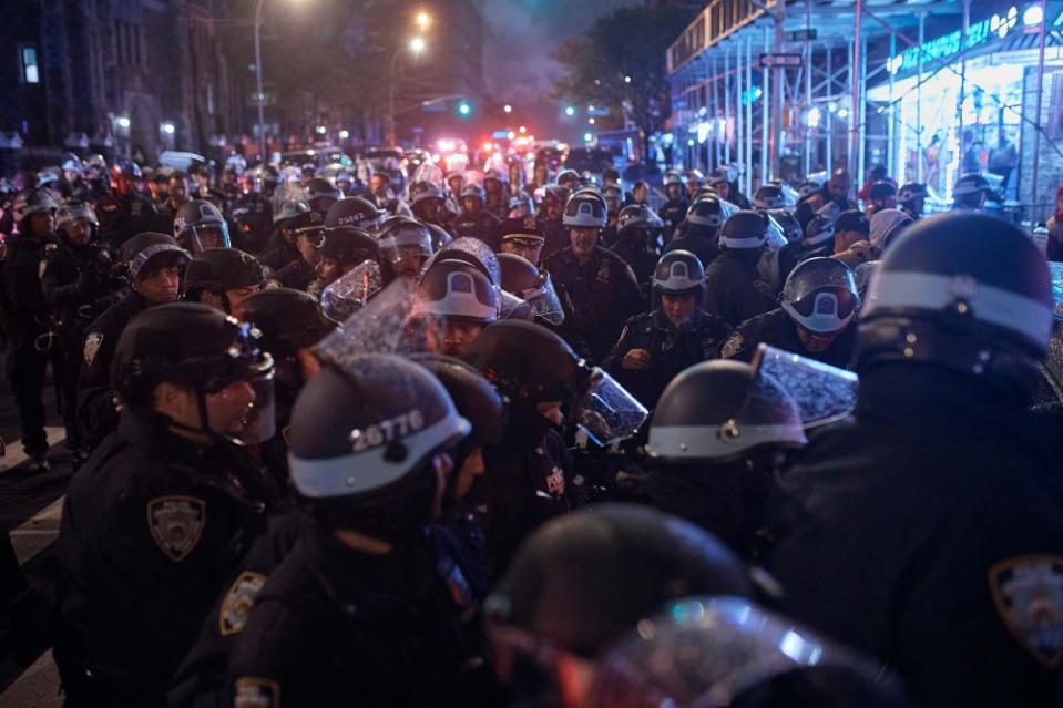 Police arrest protestors for blocking the road during a pro-Palestinian protest, outside The City College of New York.<span class="copyright">Andres Kudacki for TIME</span>