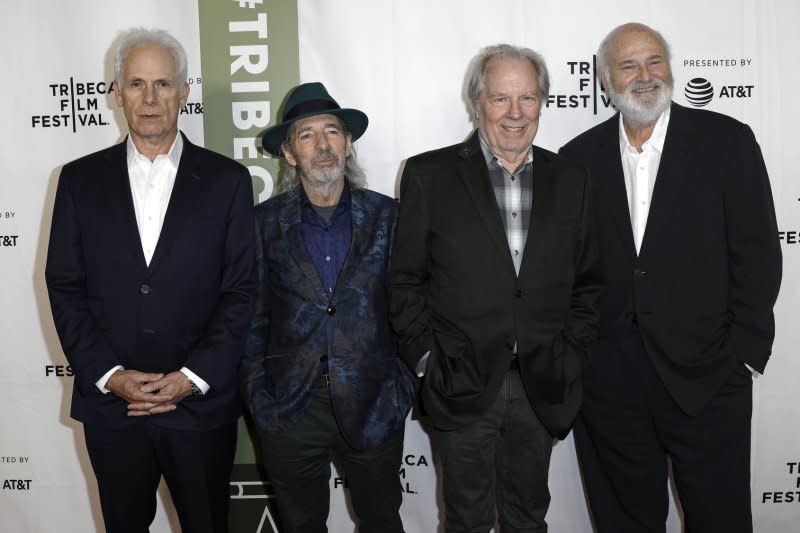 From left to right, "This is Spinal Tap" cast members Christopher Guest, Harry Shearer, Michael McKean and director Rob Reiner attend the 35th anniversary of the film at the 2019 Tribeca Film Festival. File Photo by Peter Foley/UPI