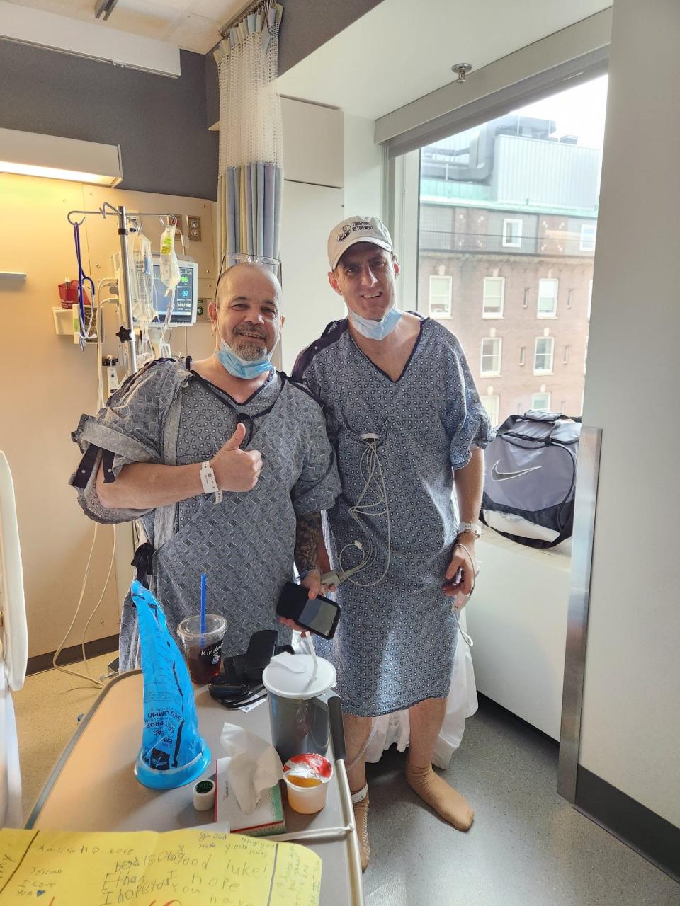 Former Quincy City Councilor Brad Croall, right, and his kidney donor, Mike Smith, one day after the transplant.