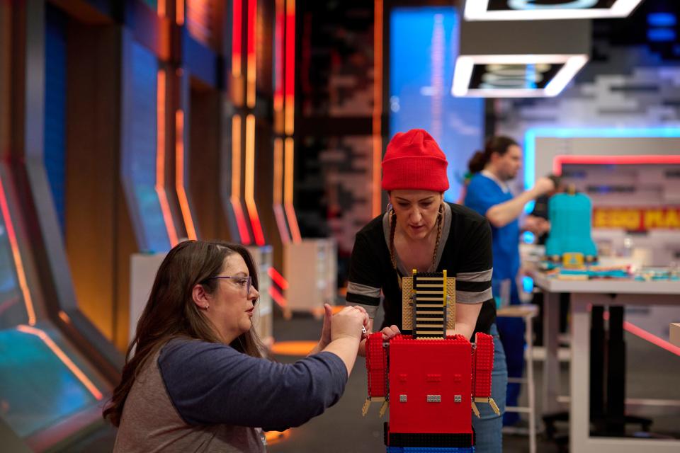 Liz Puleo, right, of Hudson competes in a competition with her friend Erin Laundry on "Lego Masters," a television show on Fox that pits Lego builders against one another.