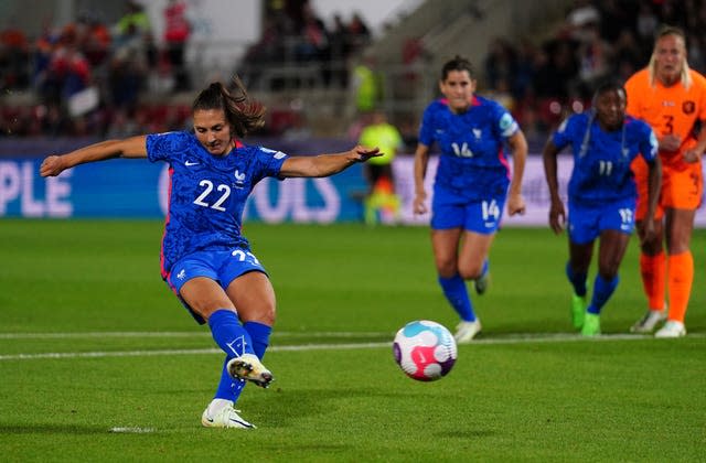 France's Eve Perisset scores a penalty