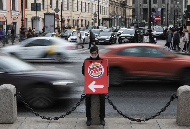 A Burger King promoter works at Nevsky Avenue in Saint Petersburg