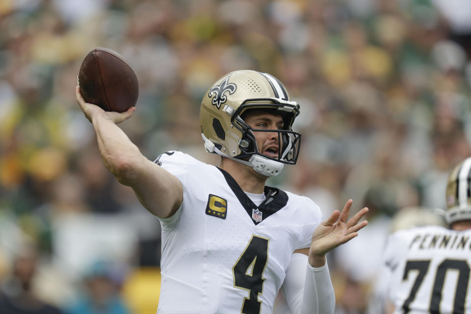 New Orleans Saints quarterback Derek Carr (4) passes during the first half of an NFL football game against the Green Bay Packers Sunday, Sept. 24, 2023, in Green Bay, Wis. (AP Photo/Matt Ludtke)